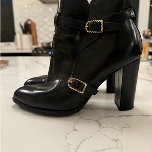 Chic Black Heeled Boots with Gold Buckles